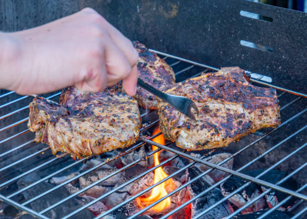 istock Barbecue time in the garden with steak 1164165742