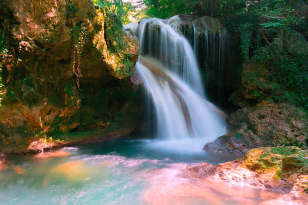 istock La Vaioaga waterfall encountered while trekking on Nera Gorges during summer, Romania 1164169196