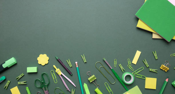 Flat lay of office, school stationery on grey background