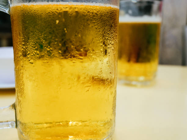 istock Close-up beer cool glass on table. 1164171338