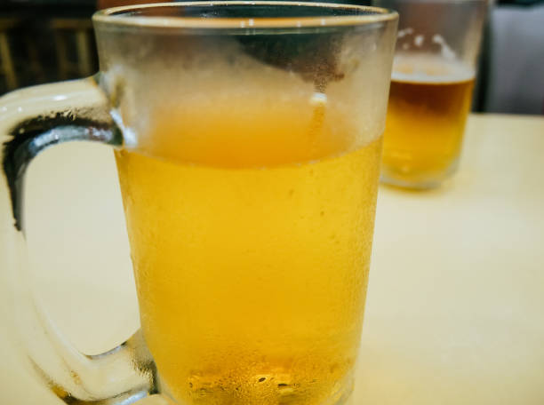 istock Close-up beer cool glass on table. 1164171341