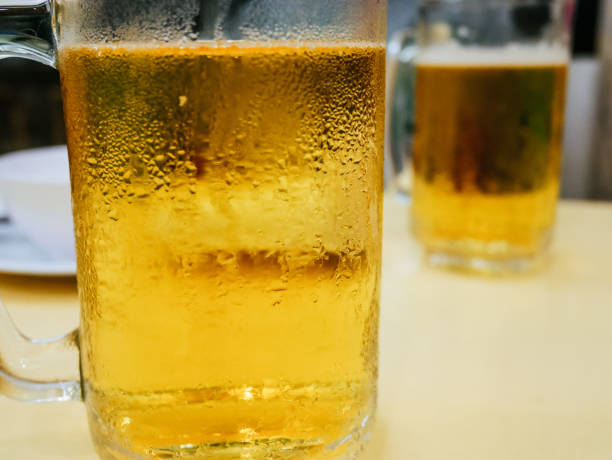 istock Close-up beer cool glass on table. 1164171386