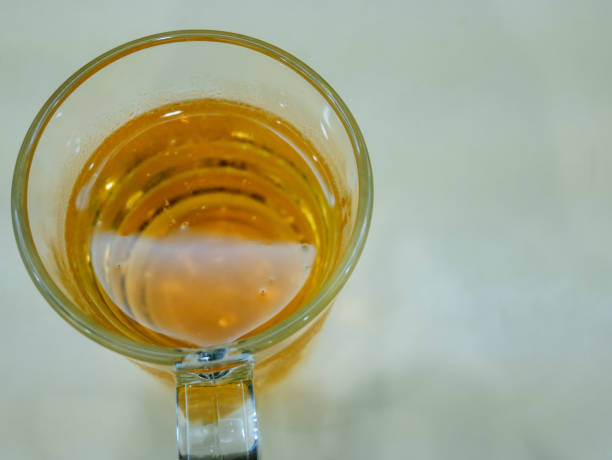 istock Close-up beer cool glass on table. 1164171396