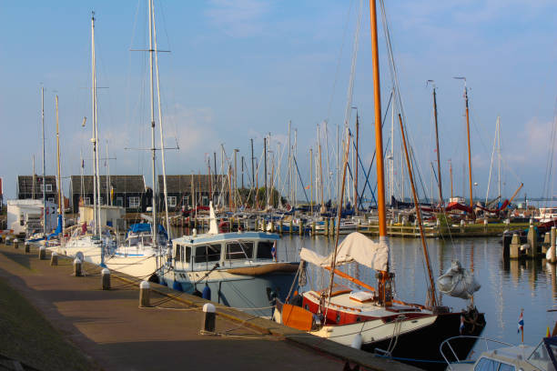 istock beautiful netherlands harbor boats still water nature 1164171505