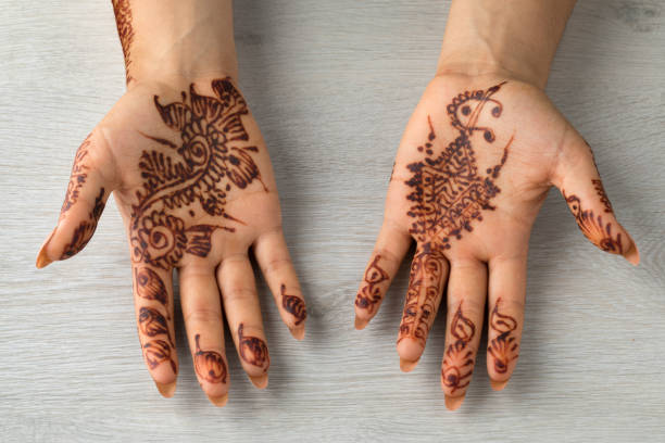 istock Moroccan woman with henna painted hands 1164172225