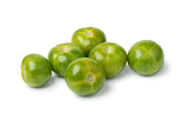 Whole green striped tomatoes