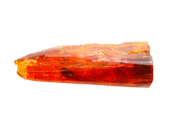 istock Red-yellow colored piece of amber on a white background. 1164174758