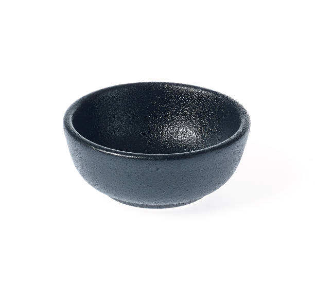 istock Black ceramic small sauce dish isolated on white background. 1164174933