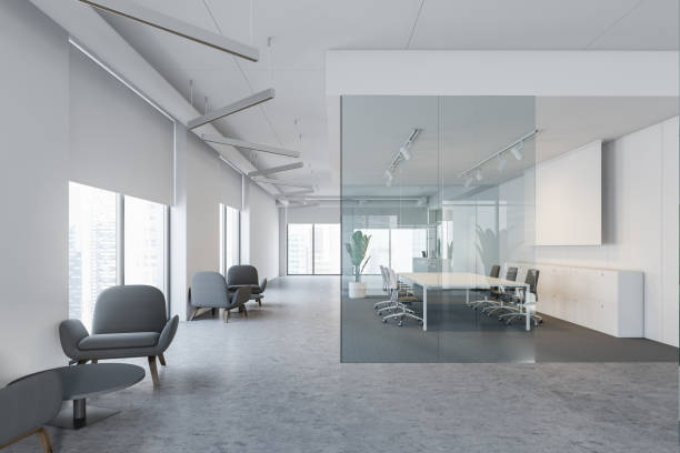 istock White and glass conference room with screen 1164176062