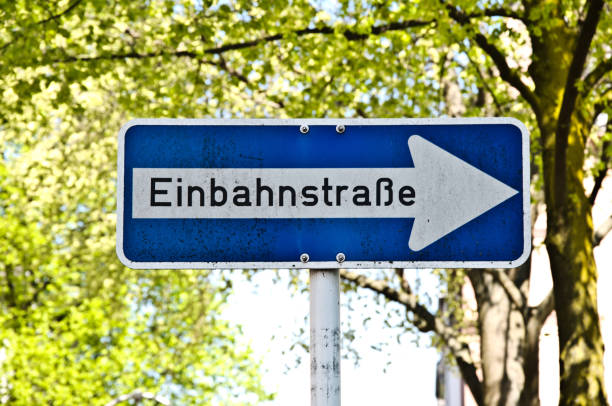 istock A weathered and dirty Einbahnstrasse (one-way street) sign 1164176570