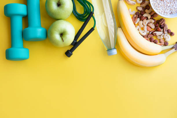 istock Healthy lifestyle concept on yellow background with copy space 1164177566