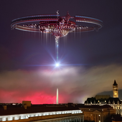 3D Illustration of an alien spaceships over the Washington DC firing the primary weapon, for science fiction alien contact backgrounds, futuristic interstellar travel, or fantasy war-games.