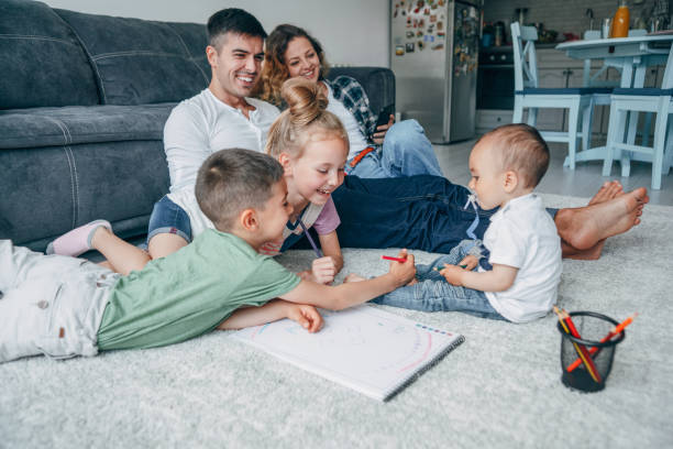 istock Young happy family drawing 1164179741