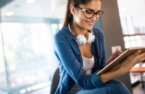 istock Beautiful student woman studying and learning at college 1164182601