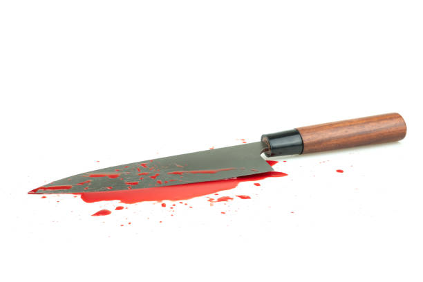 istock High contrast image knife bloody on white background 1164183464