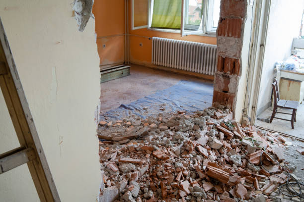 istock Wall smashed into debris room in apartment ready for renovation with destroyed smashed wall demolish 1164185796