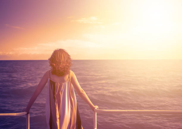 istock Behind girl on pier. 1164188509
