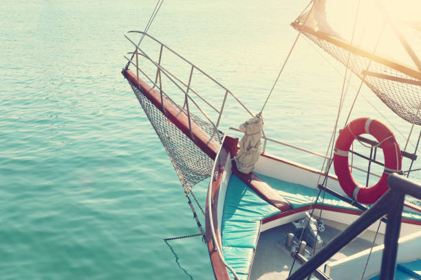 istock transportation image of ship's bow, moving through the sea 1164189864