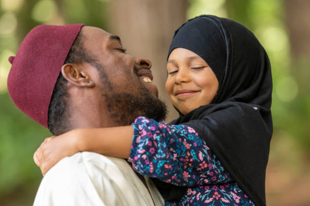 Muslim father and daughter at her first day of school Black Muslim father and daughter at her first day of school kenyan culture stock pictures, royalty-free photos & images