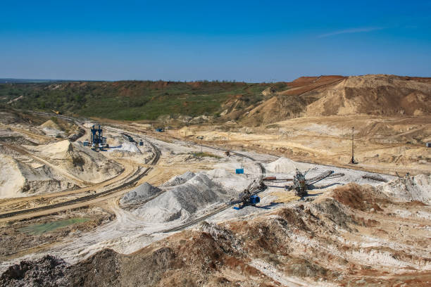 istock Rotary excavator in kaolin quarry 1164191081