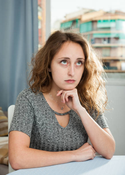istock Portrait of single sad woman 1164194871