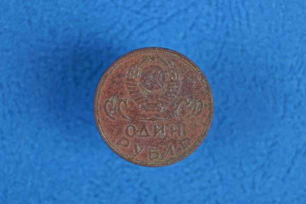 istock one old red Soviet ruble coin with coat of arms 1164196158