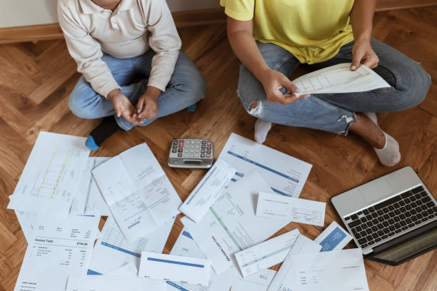 istock Mother and Son Managing the debt 1164197265