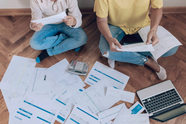 istock Mother and Son Managing the debt 1164197448