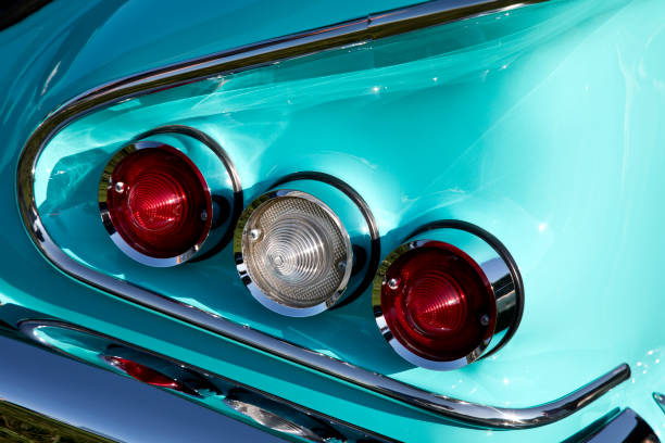 istock Tail lights of an old classic car, red, white, red 1164202996
