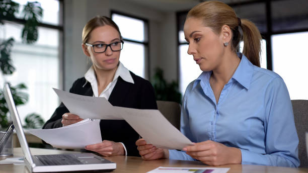 istock Senior manager dissatisfied with incompetent trainee mistakes, missed deadline 1164204593