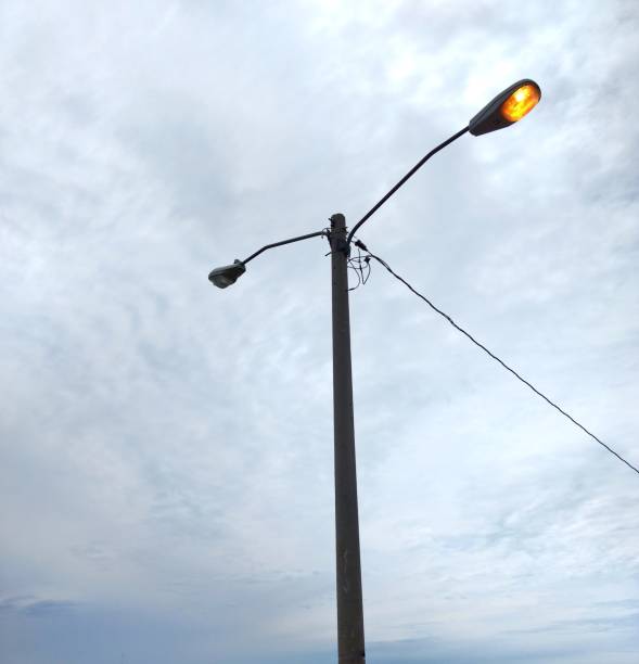 istock Street lamp on cloudy day 1164207571