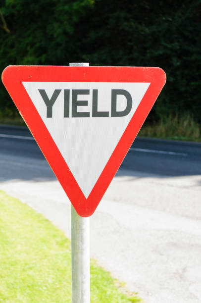istock Yield (give-way) sign on an Irish rural road 1164207766