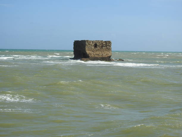 Casa Del Mar. The Atlantic ocean, the Cape Juby, Morocco. The ruined fortress, a tide, sand beach ,sea house .