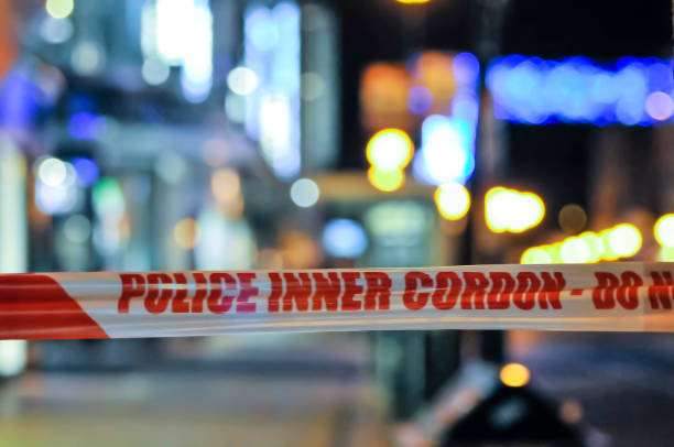 istock Police cordon tape 1164209923
