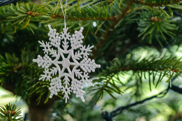 istock Christmas tree decoration in the shape of a snowflake 1164210841