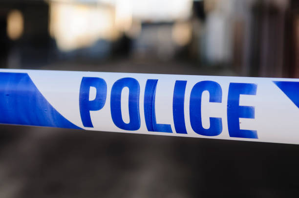 istock Police cordon tape 1164210967