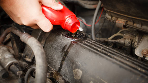 istock Motor oil, car engine close up 1164214013