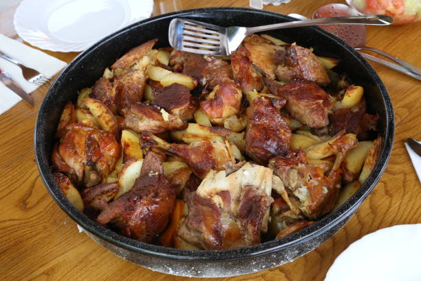istock Dish with stew and potatoes cooked on the grill 1164214996