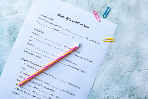 istock Empty motor vehicle bill of sale form 1164216378