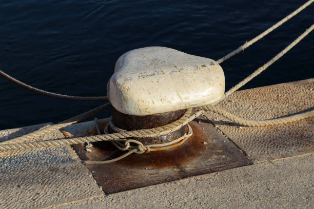 istock Bollard with a mooring line wrapped around it 1164216553