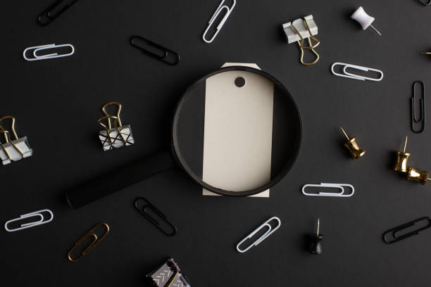 istock Flat lay, black style. Layout with white gift-box gift, Stationery set on black background. Design 1164217921