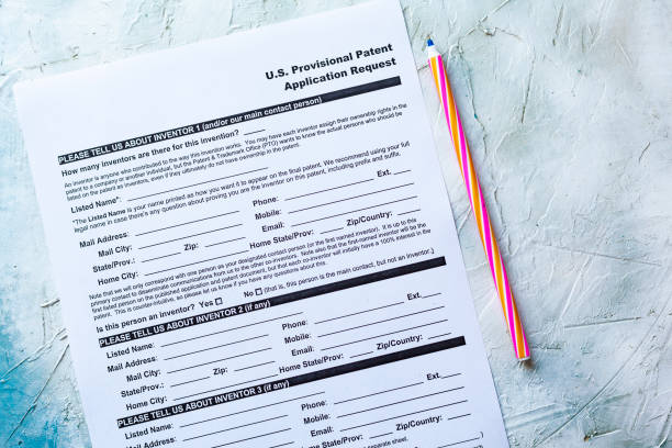 U.S. Provisional Patent. Application Request Filling U.S. Provisional Patent Application Request form provisional patent stock pictures, royalty-free photos & images
