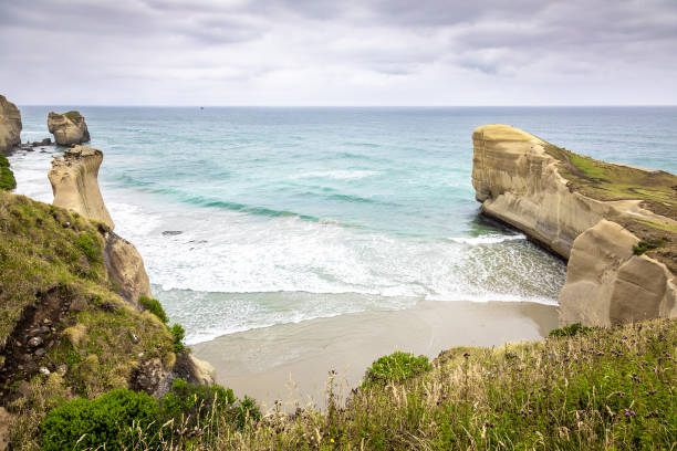 istock Tunnel Beach New Zealand 1164220002