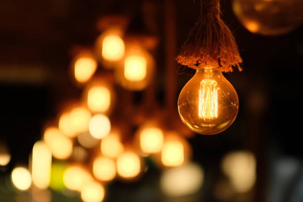 istock close up round dazzle bulb under tassel. 1164223835