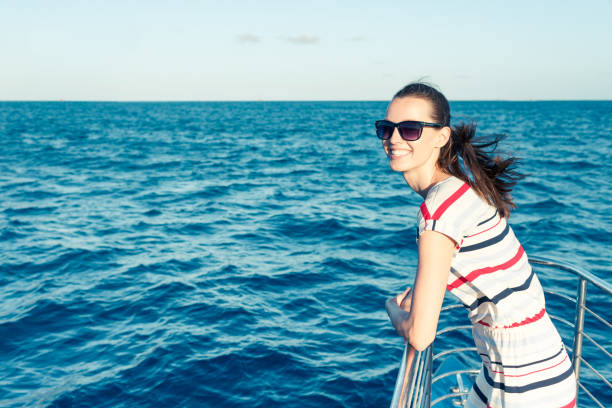 istock Young woman out at sea. 1164225924