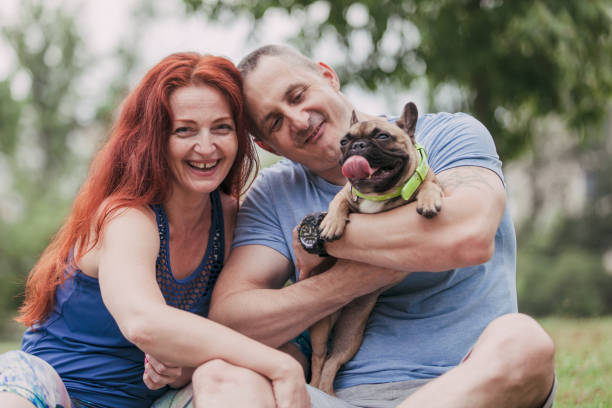 istock Couple Enjoying Their Dog 1164226892