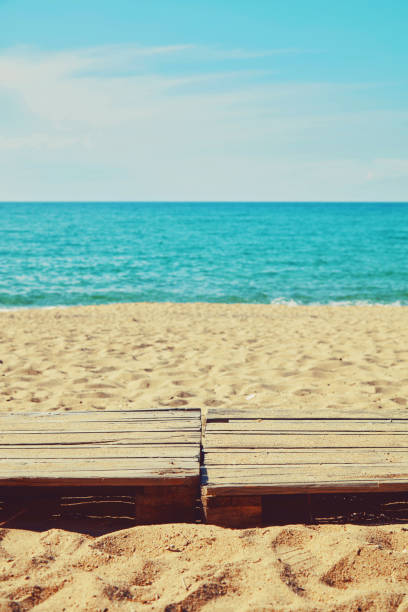 istock Wooden dock on the tropical sandy beach. Summer concept. 1164227069