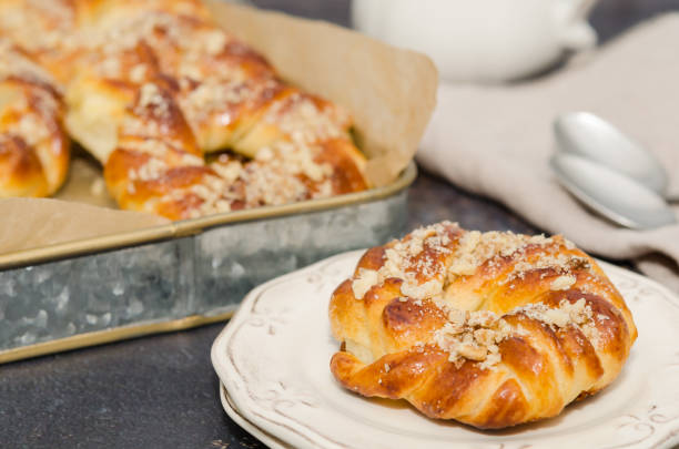 istock Sweet fresh baked buns with nuts 1164229587