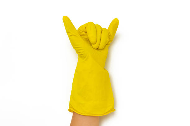 istock Cleaning glove making rock gesture isolated on white 1164232322