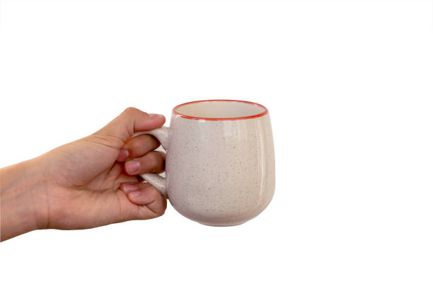 istock female hand holding a ceramic mug isolated on a white background 1164232415